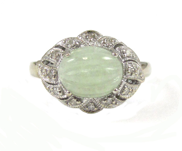 Appraisal: JADE DIAMOND AND FOURTEEN KARAT GOLD RING The white gold