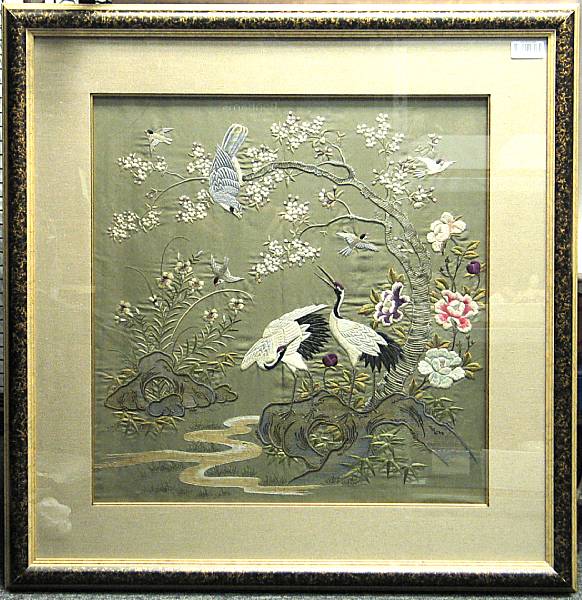 Appraisal: An embroidered silk panel Framed and glazed finely embroidered against