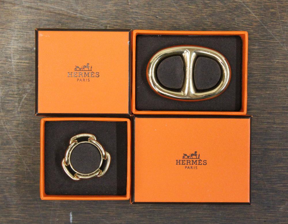 Appraisal: TWO HERMES BRASS SCARF RINGS each with the original presentation