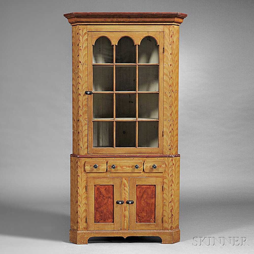 Appraisal: Paint-decorated Glazed Corner Cupboard probably Juniata County Pennsylvania - the