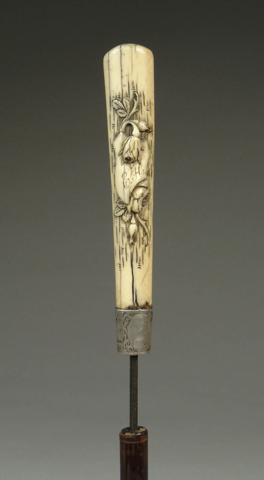 Appraisal: CARVED IVORY HANDLED SWORD CANE Long carved handle has relief