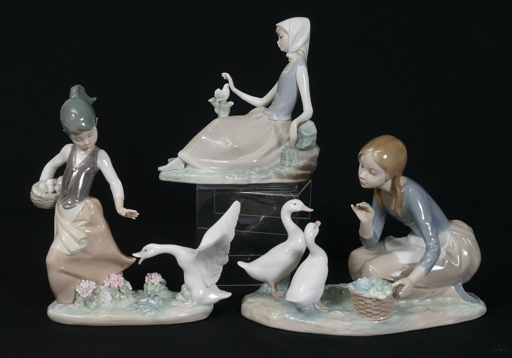 Appraisal: LLADRO PORCELAIN FIGURINES Aggressive Goose Juan Huerta sculptor issued retired