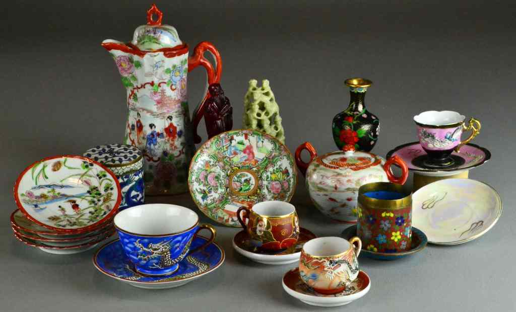 Appraisal: Pieces Chinese Japanese Decorative ArtsTo include porcelain teapots cups and