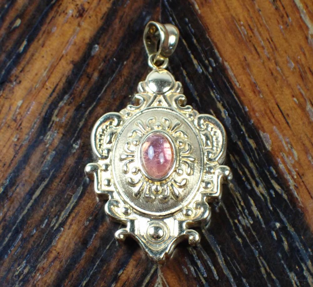 Appraisal: PINK TOURMALINE AND FOURTEEN KARAT GOLD PENDANT The Italian made