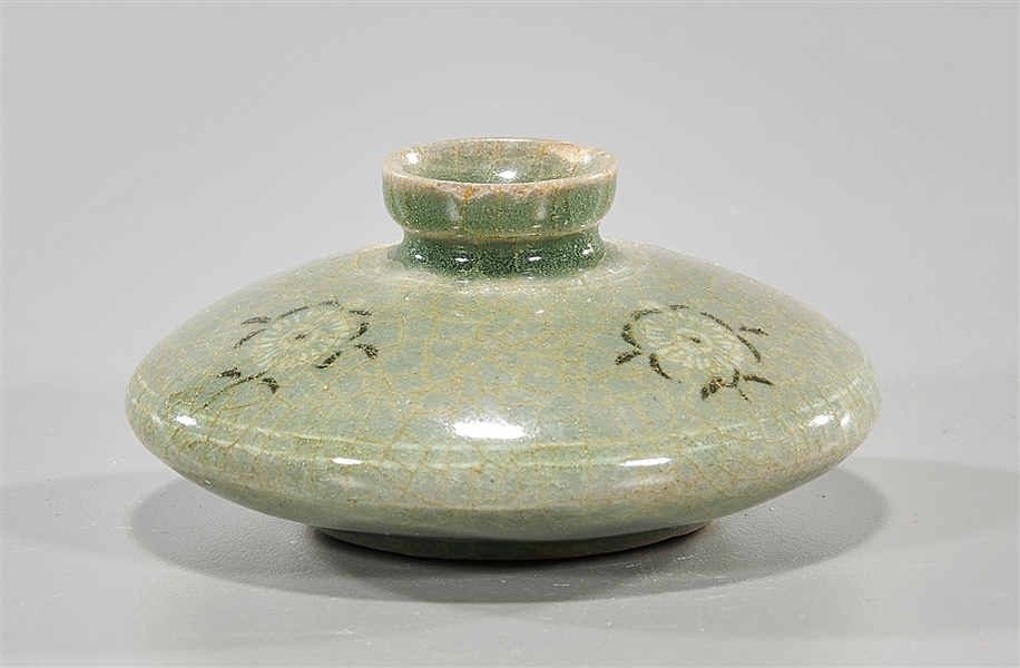 Appraisal: Korean celadon glazed cosmetic bottle with floral design x approx