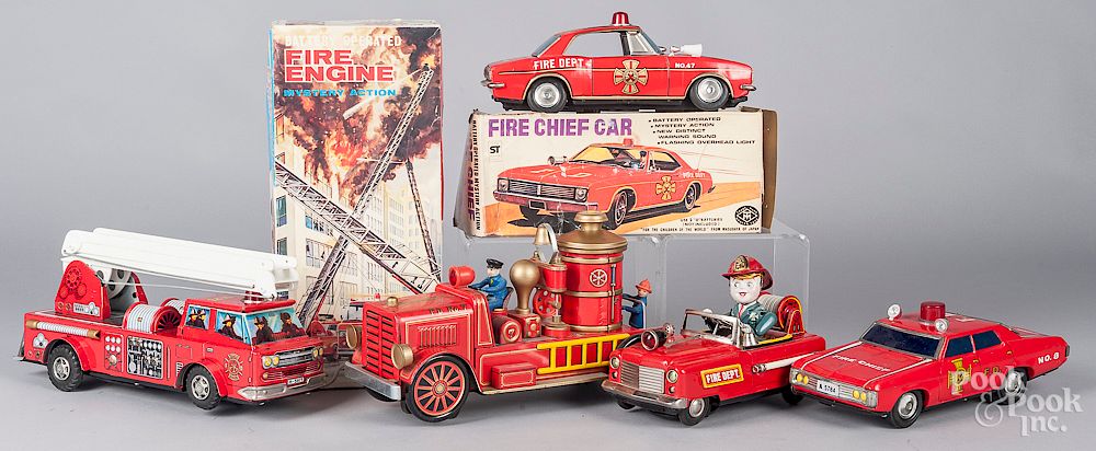 Appraisal: Six tin litho battery operated fire vehicles Six tin litho