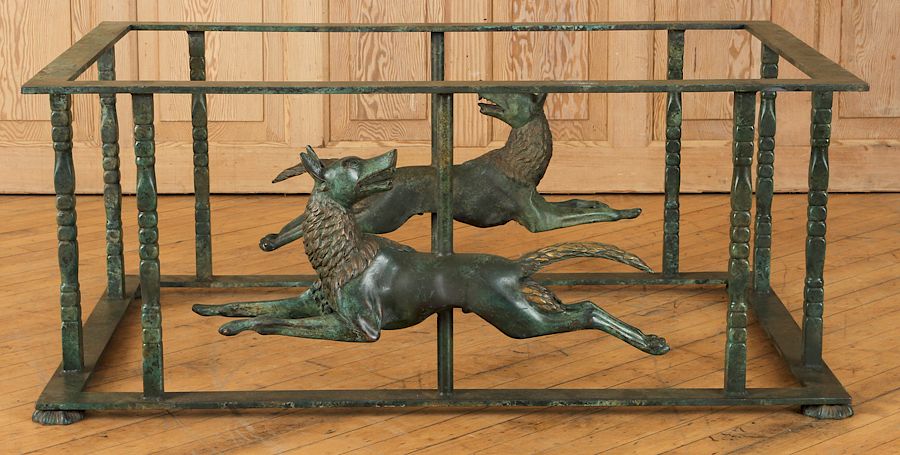 Appraisal: UNUSUAL BRONZE AND STEEL TABLE BASE CANINE MOUNTS An unusual