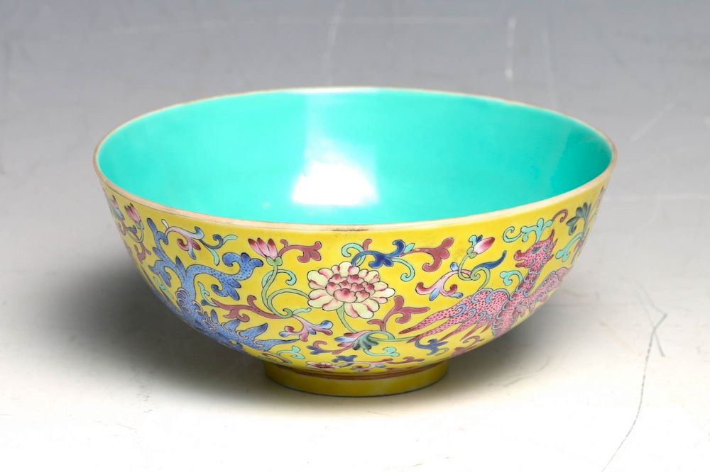 Appraisal: FAMILLE ROSE DRAGON BOWL JIAQING MARK The bowl painted with