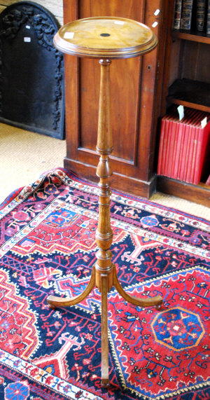 Appraisal: A th century turned fruitwood jardiniere stand of slender proportions