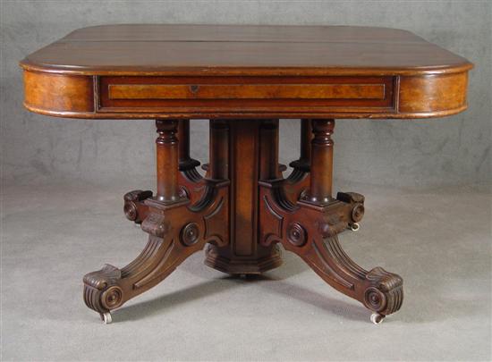 Appraisal: Walnut Expanding Pedestal Dining Table Late th Century Geometric carved