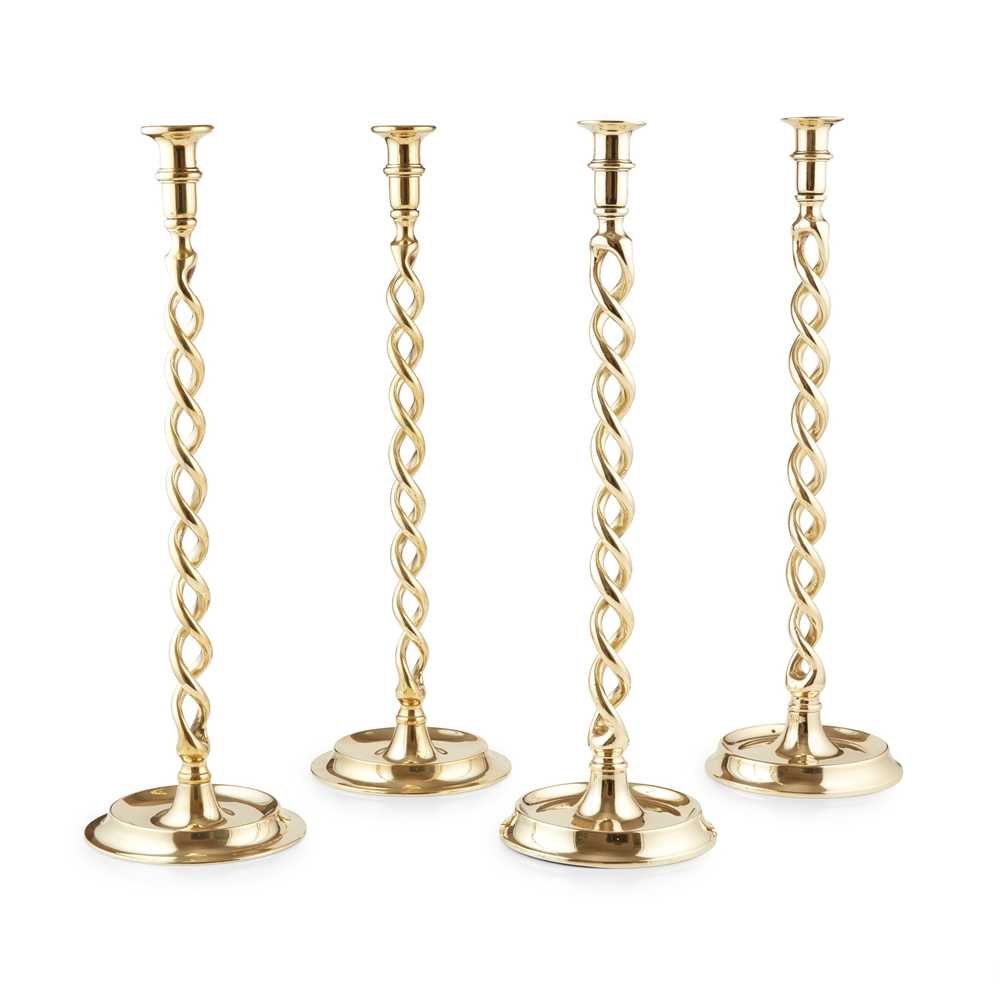 Appraisal: FOUR LARGE EDWARDIAN BARLEY TWIST BRASS CANDLESTICKS EARLY TH CENTURY