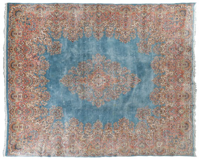 Appraisal: Crown Kerman carpet elaborate central floral medallion on medium blue