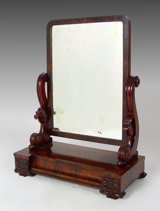 Appraisal: AMERICAN EMPIRE MAHOGANY VANITY MIRROR Flame mahogany veneer mirror frame