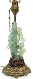 Appraisal: Chinese Carved Fluorite Guanyin Mounted as Lamp The Buddhist goddess