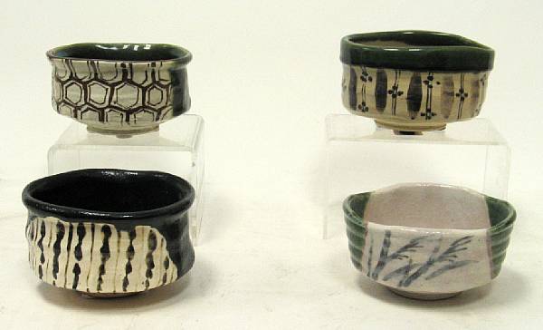 Appraisal: Four Japanese Oribe style tea bowls One painted in iron