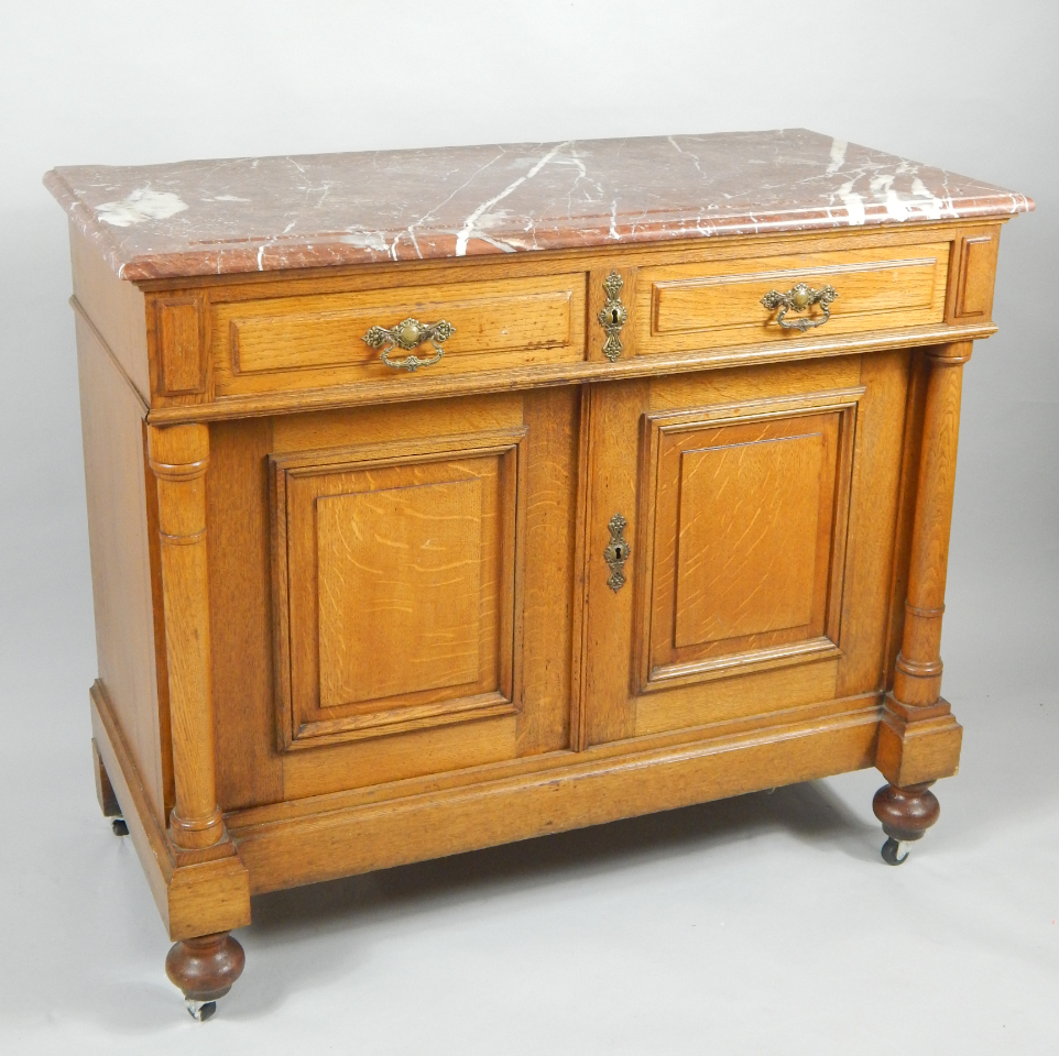 Appraisal: A Belgian oak late thC chiffonier with a veined red