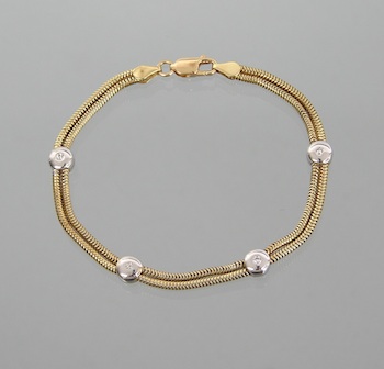 Appraisal: A k Two-Tone Gold and Diamond Bracelet k yellow gold