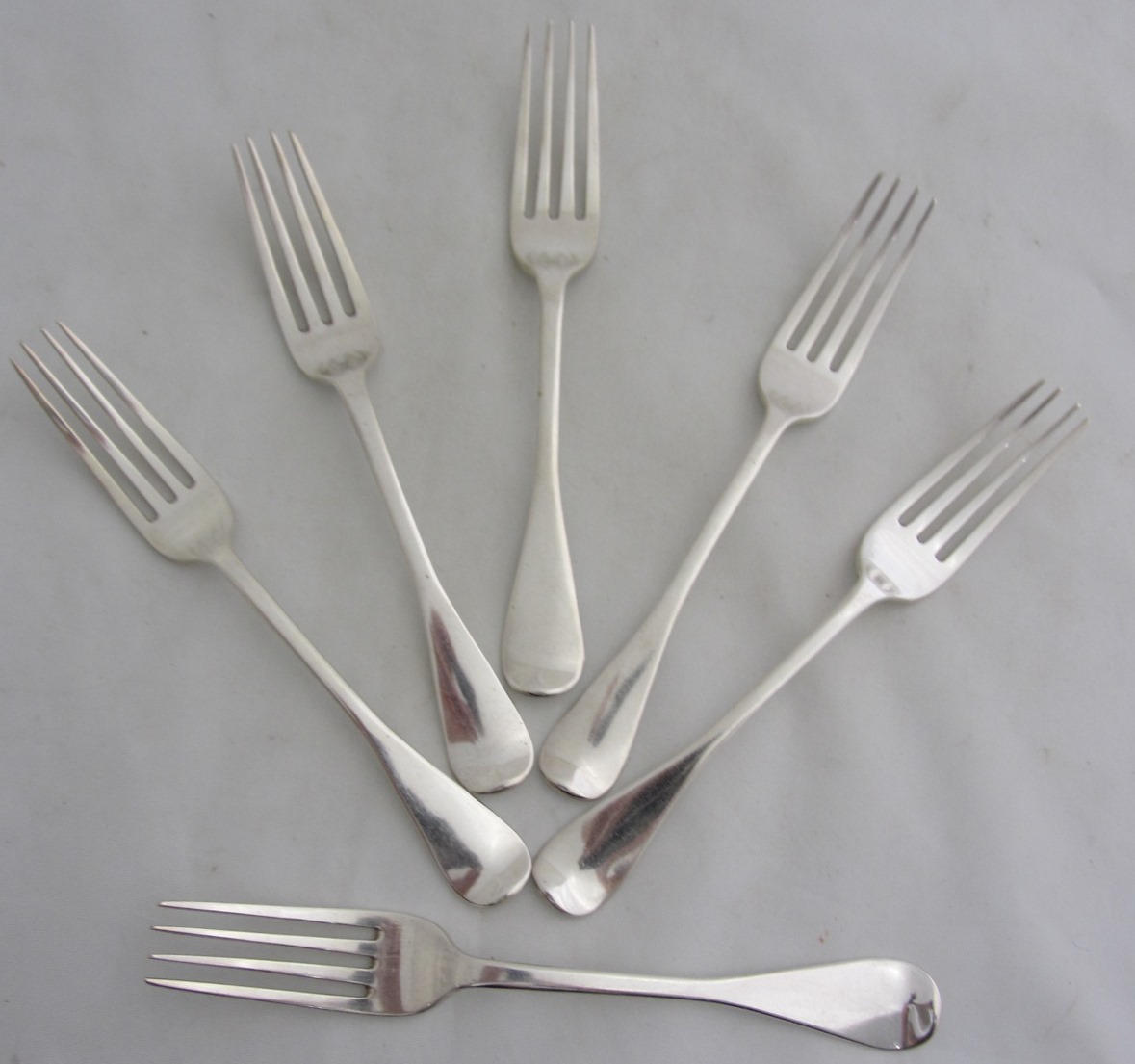 Appraisal: A set of six silver Old English pattern dessert forks