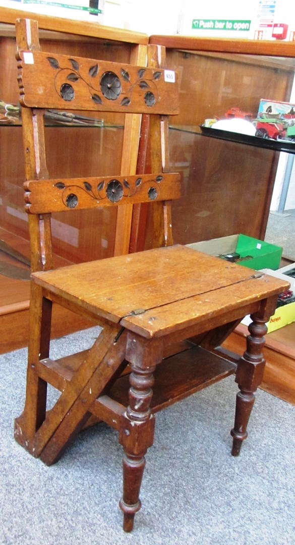 Appraisal: A Victorian oak ladder back metamorphic library chair on turned