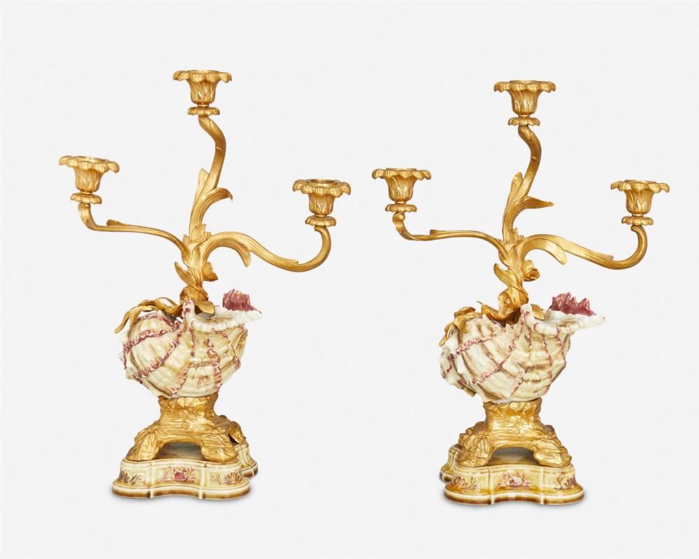 Appraisal: A pair of gilt-bronze and porcelain shell candlesticks Late th