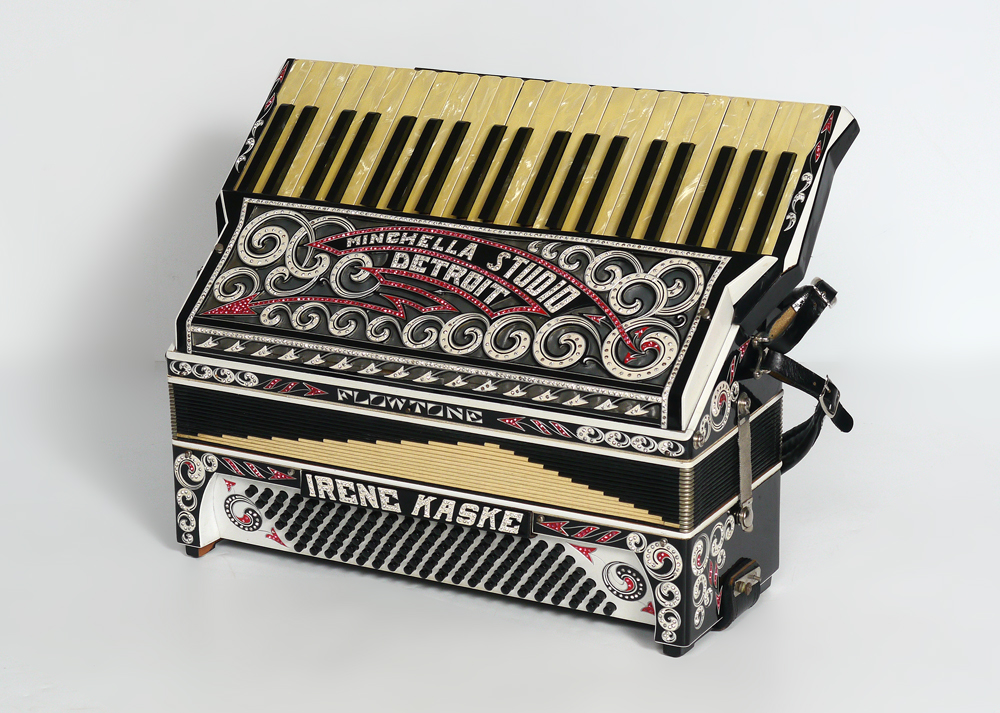 Appraisal: FLOWTONE RHINESTONE STUDDED ACCORDION Ornately decorated ''Flowtone'' accordion with owner's