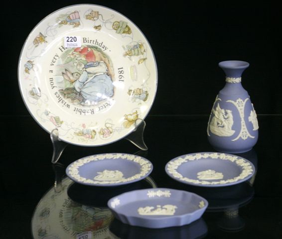 Appraisal: A Wedgwood biscuit ware vase together with three similar dishes