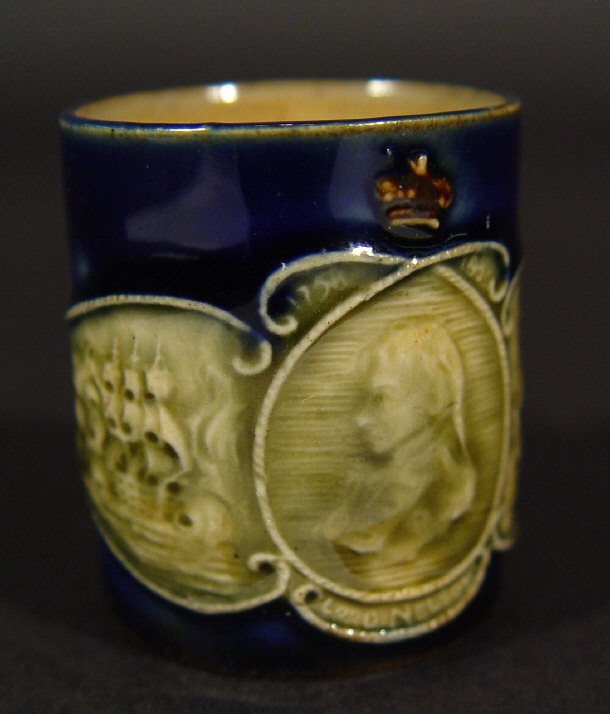 Appraisal: Miniature Royal Doulton stoneware Nelson tankard relief moulded with Nelson's