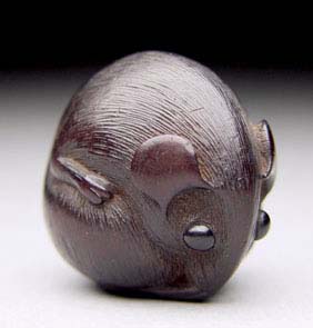 Appraisal: ANTIQUE WOOD NETSUKE Charming and antique carved wood netsuke of