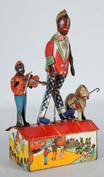 Appraisal: Tin Marx Charleston Trio Roof Dancing Wind-Up Toy Description American