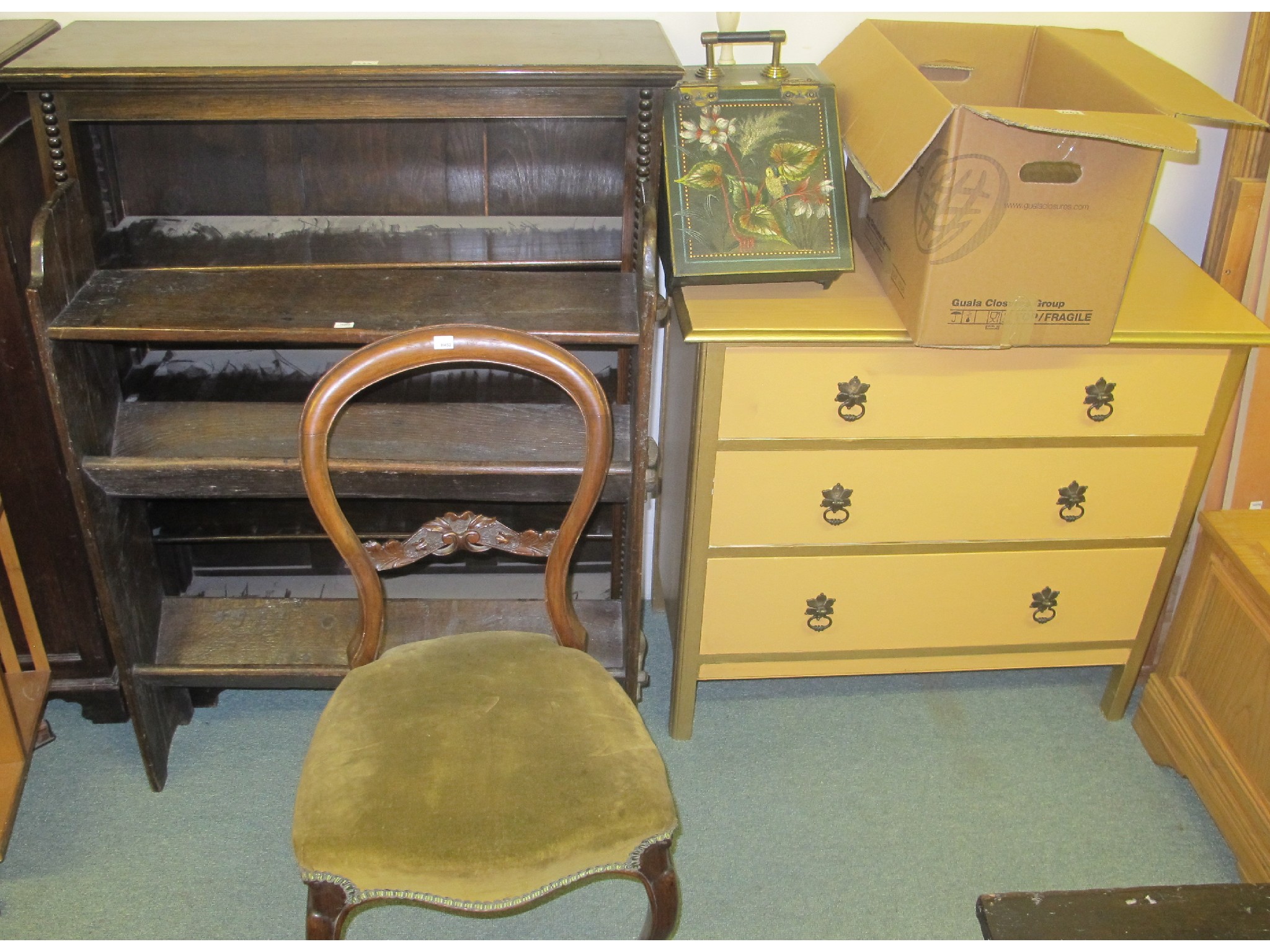 Appraisal: Two oak bookcases a chair and a chest