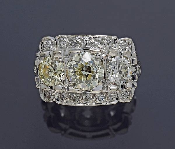 Appraisal: A diamond ring centering a transitional-cut diamond principal diamond weighing