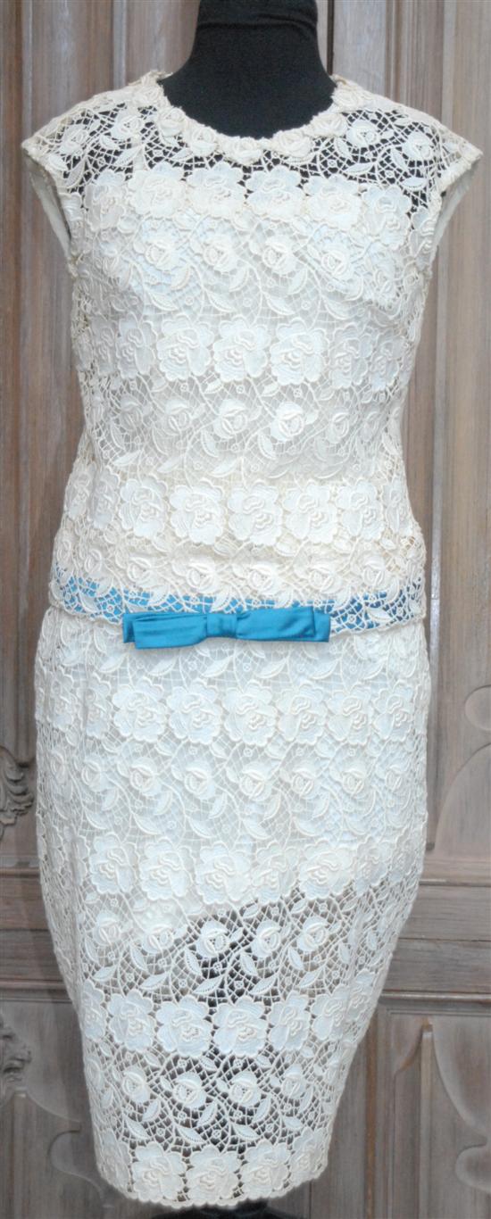 Appraisal: COCKTAIL DRESS White lace with turquoise detail sizes avarage ladies