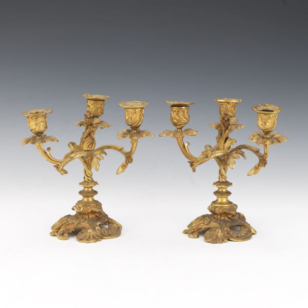 Appraisal: PAIR OF ROCOCO THREE-LIGHT CANDELABRA x Finely cast gilt bronze