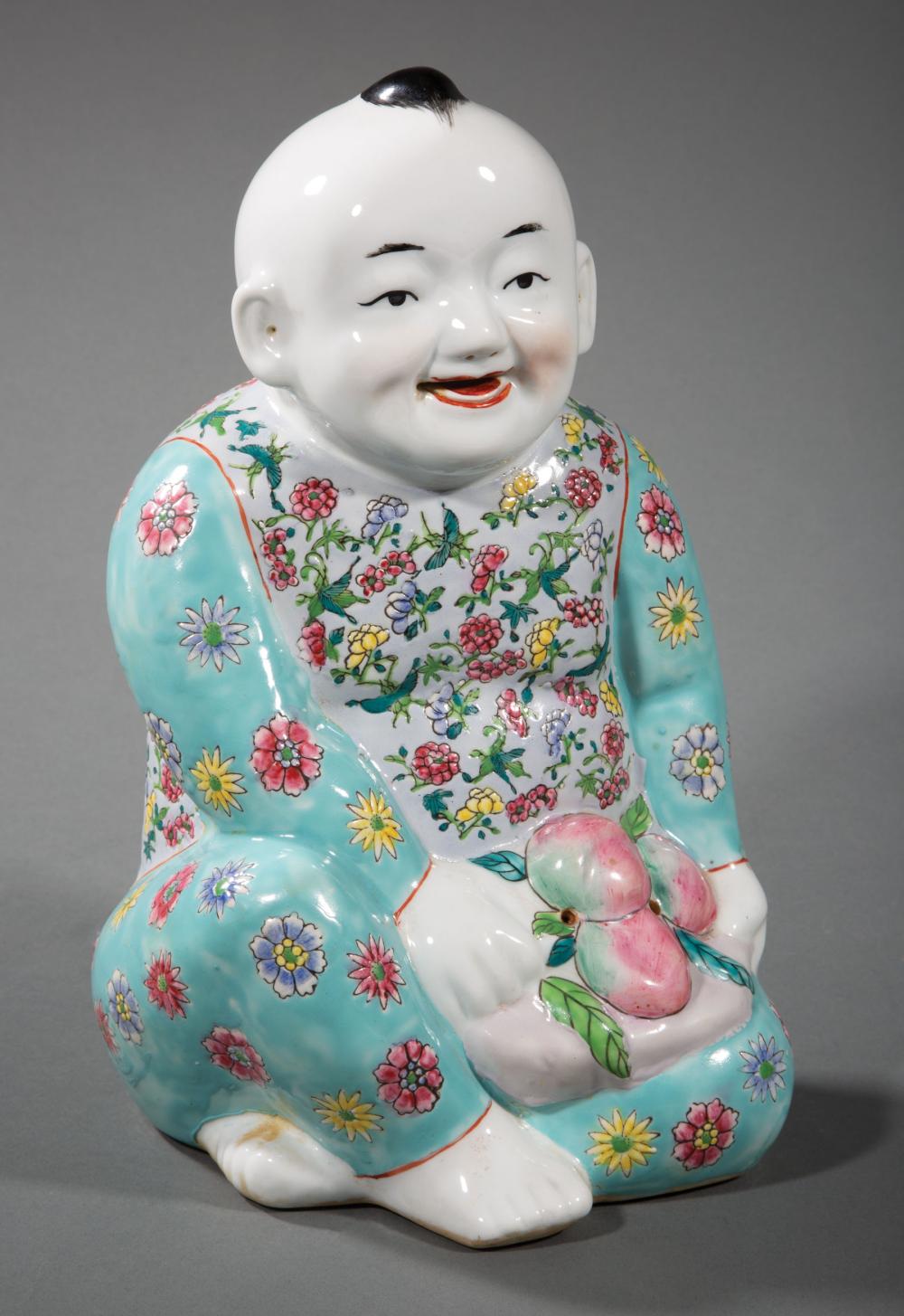 Appraisal: Chinese Famille Rose Porcelain Figure of a Happy Boy modeled