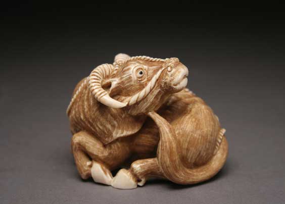 Appraisal: CARVED IVORY OKIMONO Well carved ivory okimono of a nicely