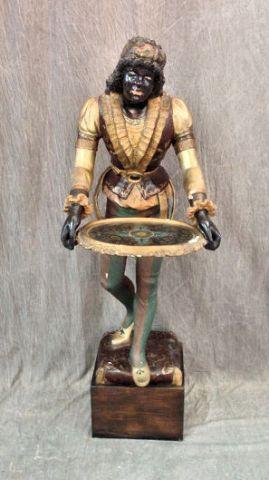 Appraisal: Blackamoor Antique Polychrome Gilt Blackamoor Holding a Decorated Tray Minor