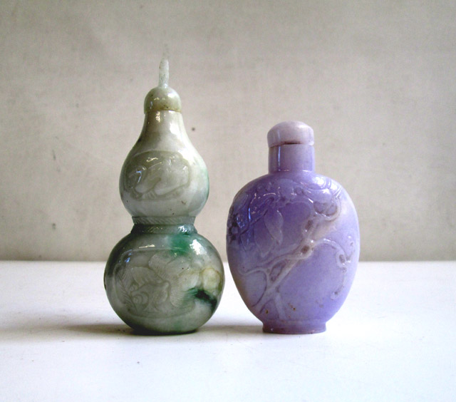 Appraisal: TWO CHINESE CARVED JADE SNUFF BOTTLES the first of lavender