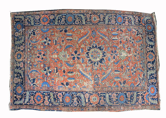 Appraisal: A HEREZ RUST GROUND CARPET with an all over foliate