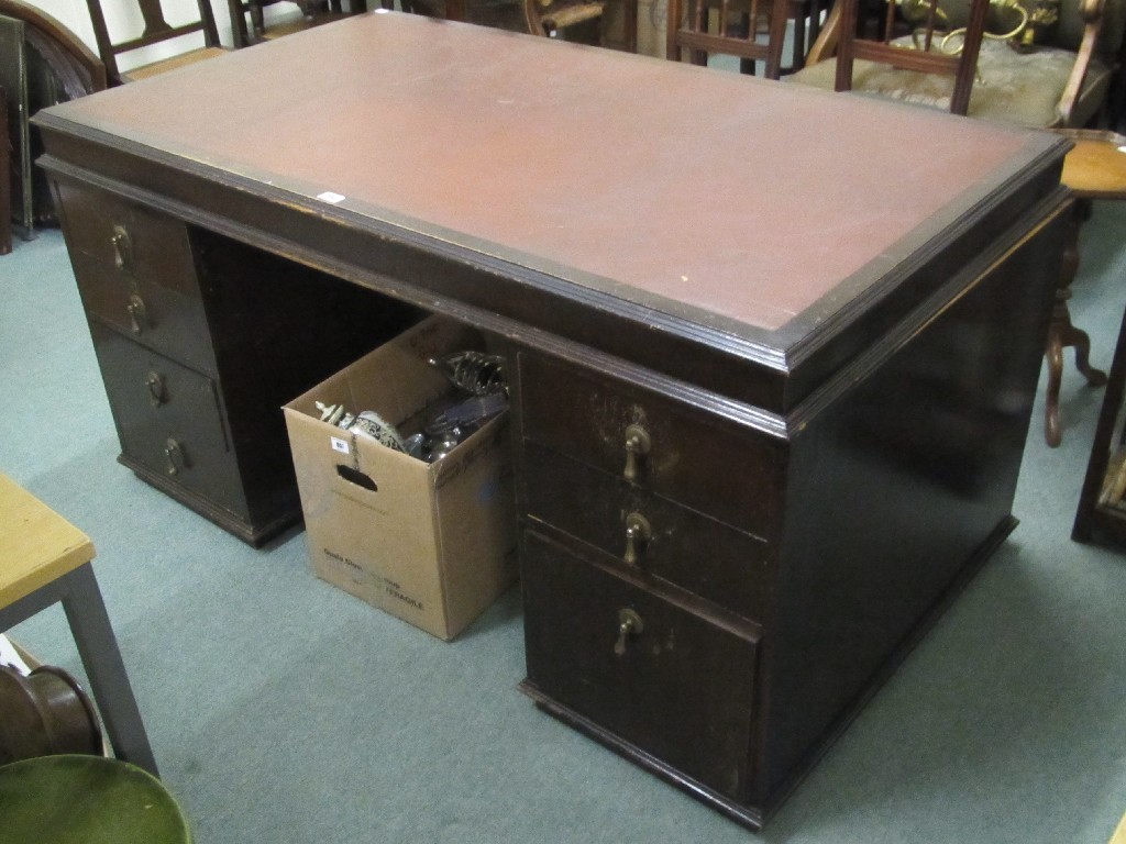 Appraisal: Oak kneehole desk with leather top