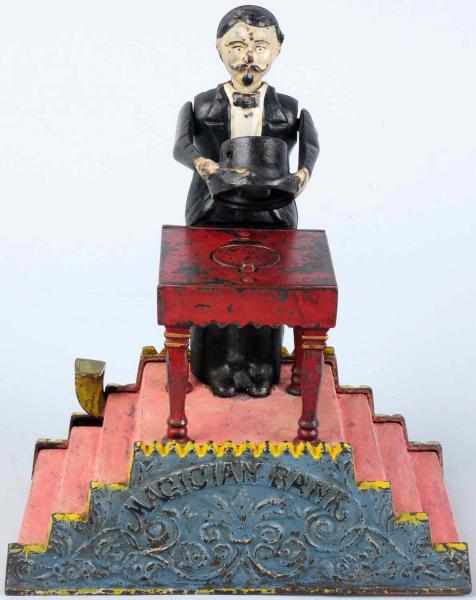 Appraisal: Cast Iron Magician Mechanical Bank Manufactured by J E Stevens