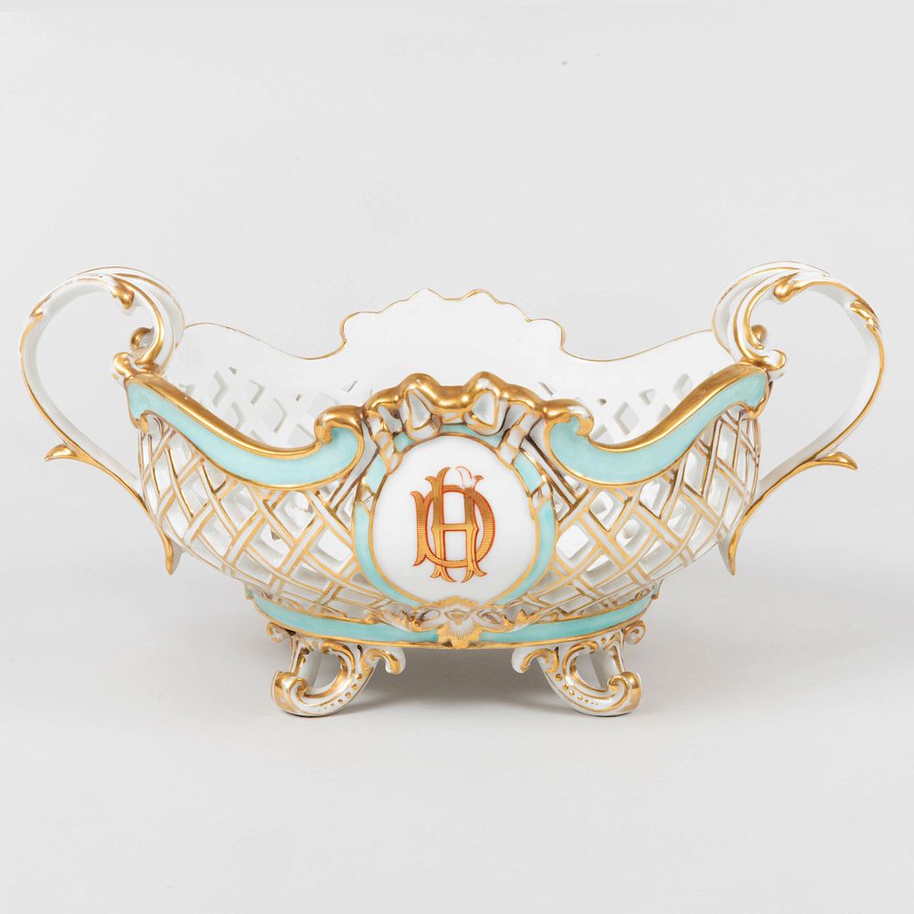 Appraisal: Paris Porcelain Monogrammed and Reticulated Two Handled Bowl in wide