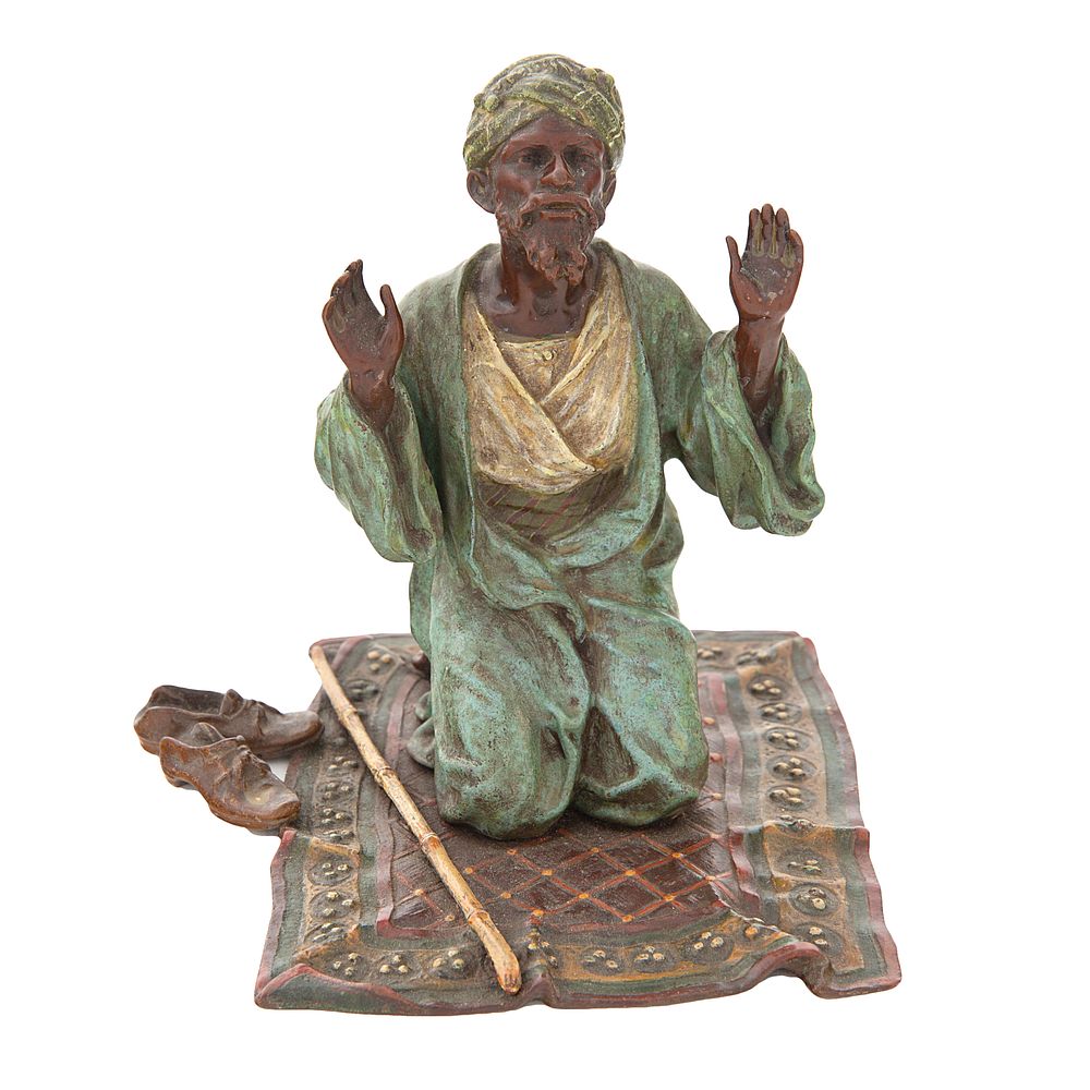 Appraisal: AN AUSTRIAN COLD-PAINTED BRONZE MODEL OF A MAN AT PRAYER