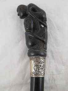 Appraisal: Tribal art a Victorian silver mounted ebony walking cane with