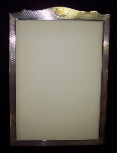 Appraisal: A photograph frame with easel back Birmingham cm high