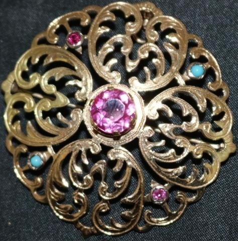 Appraisal: KT YELLOW GOLD FILIGREE BROOCH WITH CENTERRUBY SMALL RUBIES SMALL