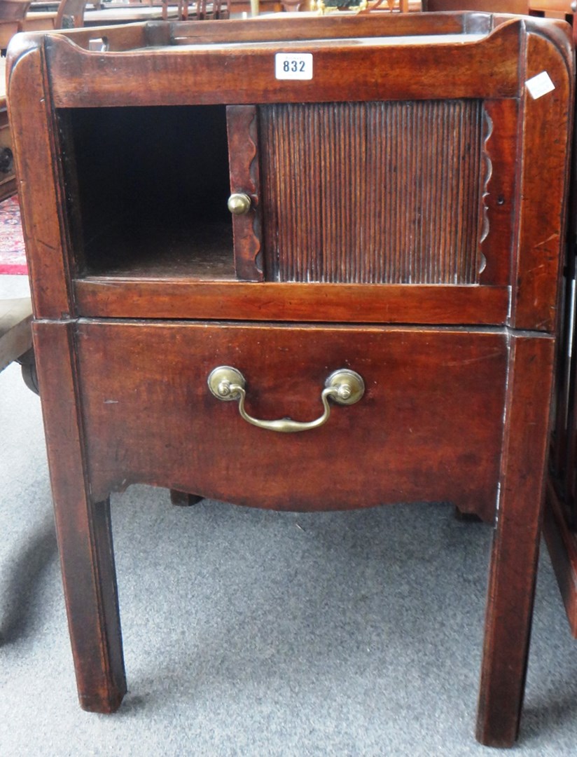 Appraisal: An th century mahogany tray top commode with tambour panel