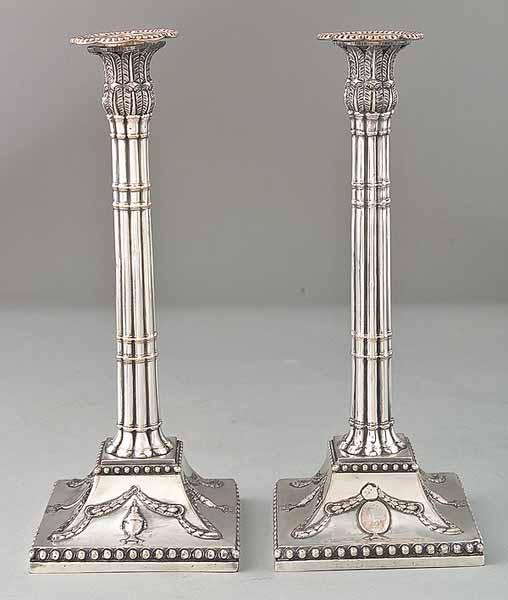 Appraisal: A Pair of Crested Georgian Sheffield Table Candlesticks c banded