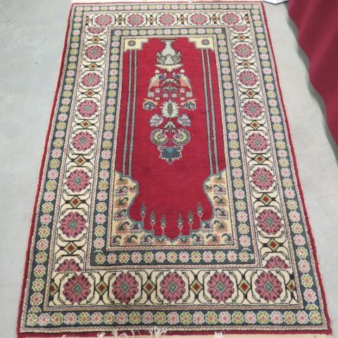 Appraisal: Mahal Persian Handmade Prayer Rug vase with florals on red