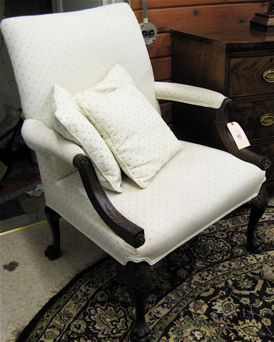 Appraisal: CHIPPENDALE STYLE ARMCHAIR American c 's having a square padded