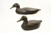 Appraisal: PAIR CARVED DUCK DECOYS - Chocolate Brown Ducks by Gus